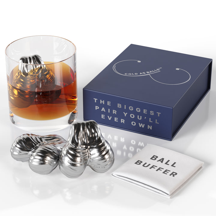 Close-up of Cold As Balls Whiskey Stones in glass - perfect funny gift for whiskey lovers.